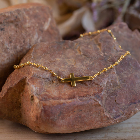 Pulsera "Cruz dorada"